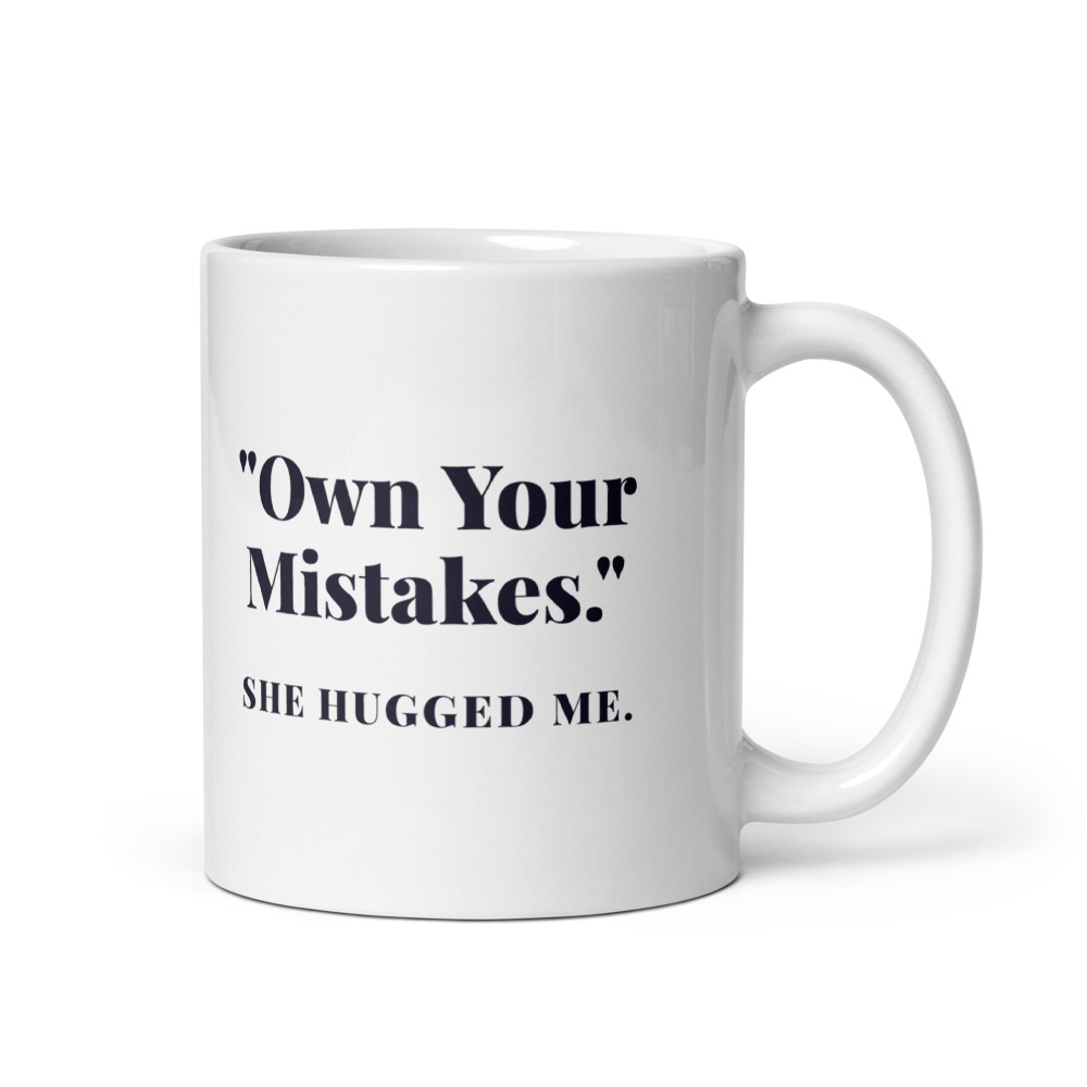 "Own Your Mistakes." She hugged me. Mug