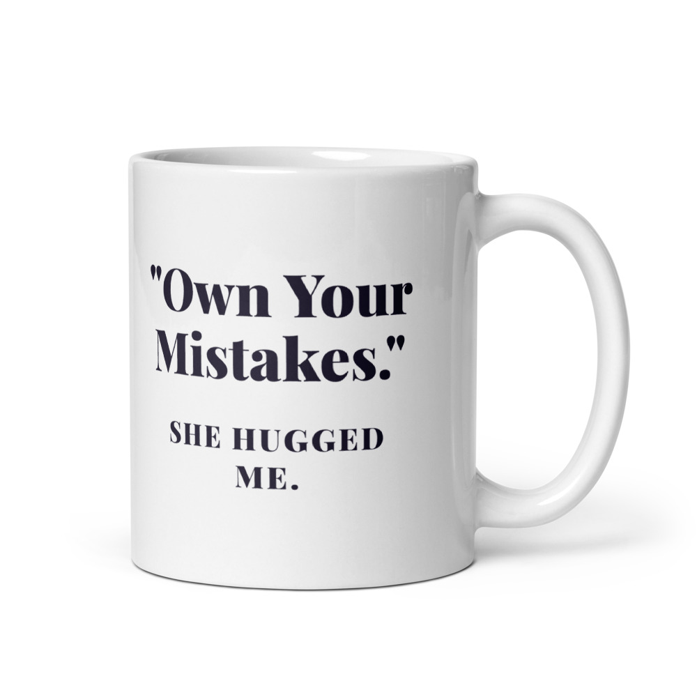 "Own Your Mistakes." She hugged me. Mug