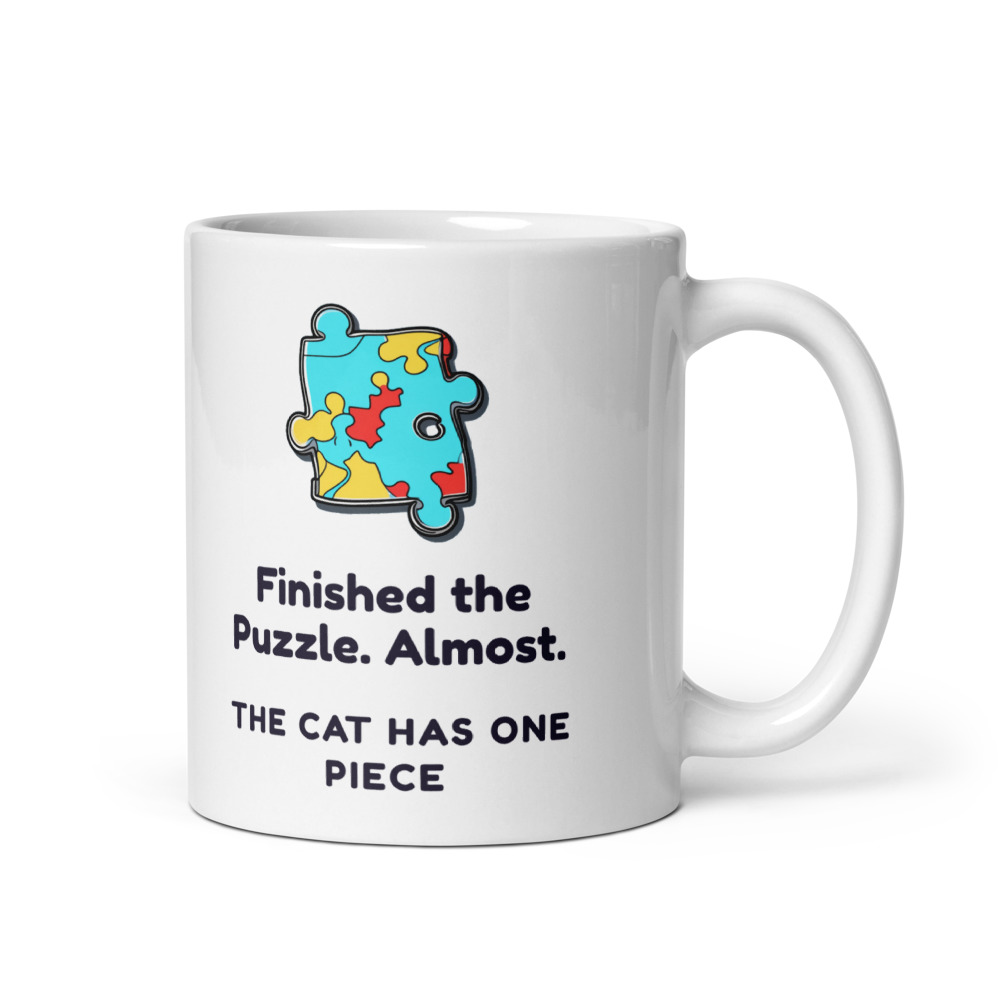 Finished the Puzzle. Almost. The cat has one piece Mug